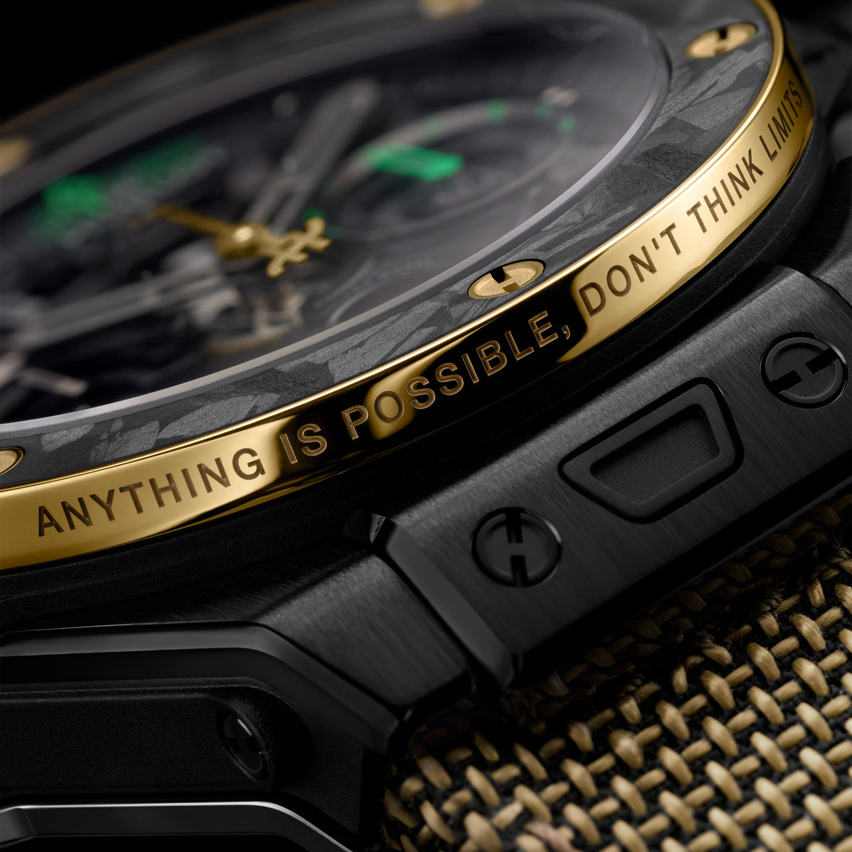Hublot Big Bang Reloaded Usain Bolt Ceramic Carbon 44 mm 421.CQ.1140.NR.USB26 – engraved gold bezel close-up