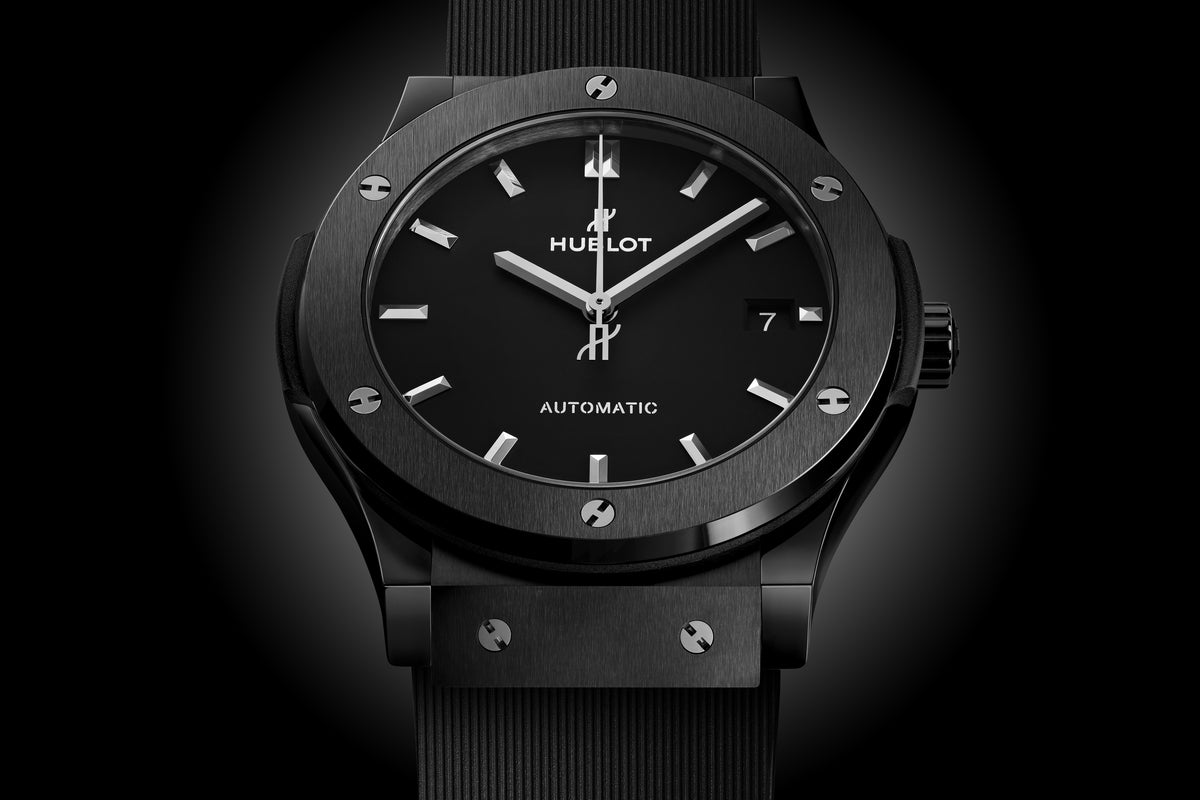 Hublot Classic Fusion Black Magic 45 mm 511.CM.1171.RX – front view on dark background