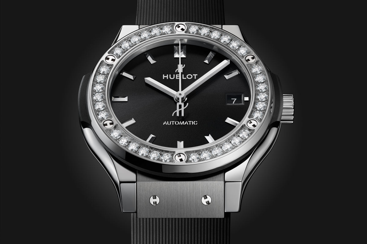Hublot Classic Fusion Titanium Diamonds 38 mm 565.NX.1470.RX.1204 – front view on dark background